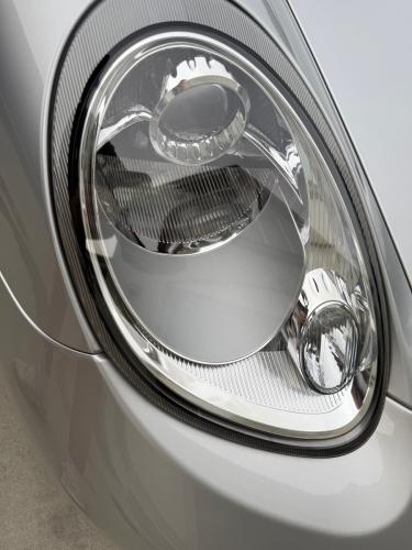 Clean headlight of Porsche car detail