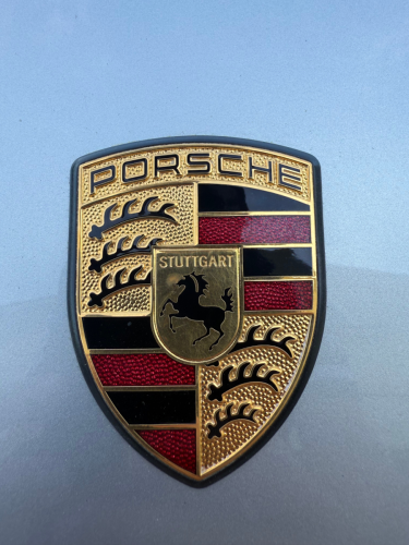 Clean Porsche logo after car detail